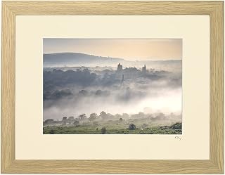 Mounted or framed photograph by Andrew Ray featuring Wheal Uny Mine captured from Carn Brea in Cornwall on a misty morning.