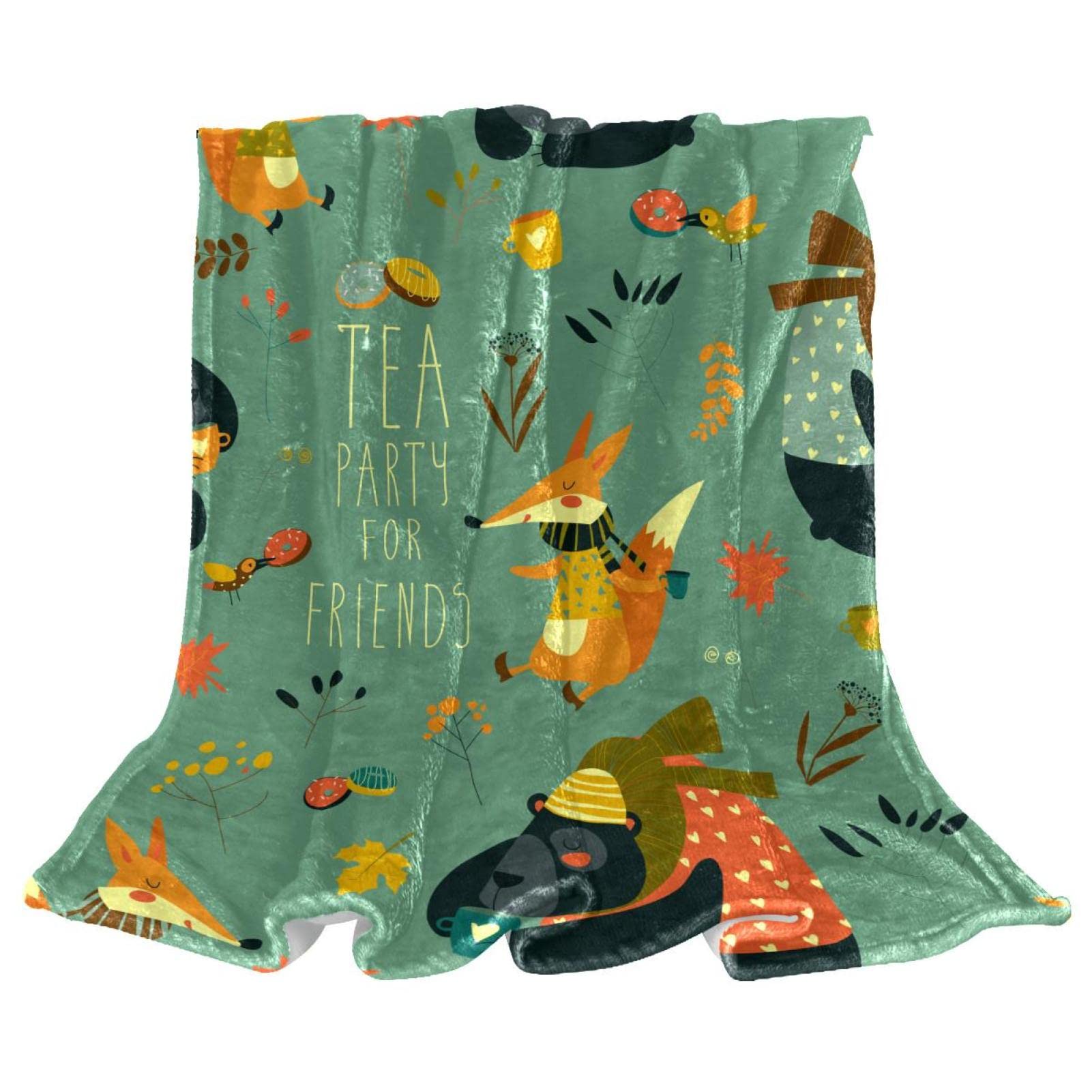 Couverture polaire literie idéale pour un moment cocooning Tea Time sur le canapé