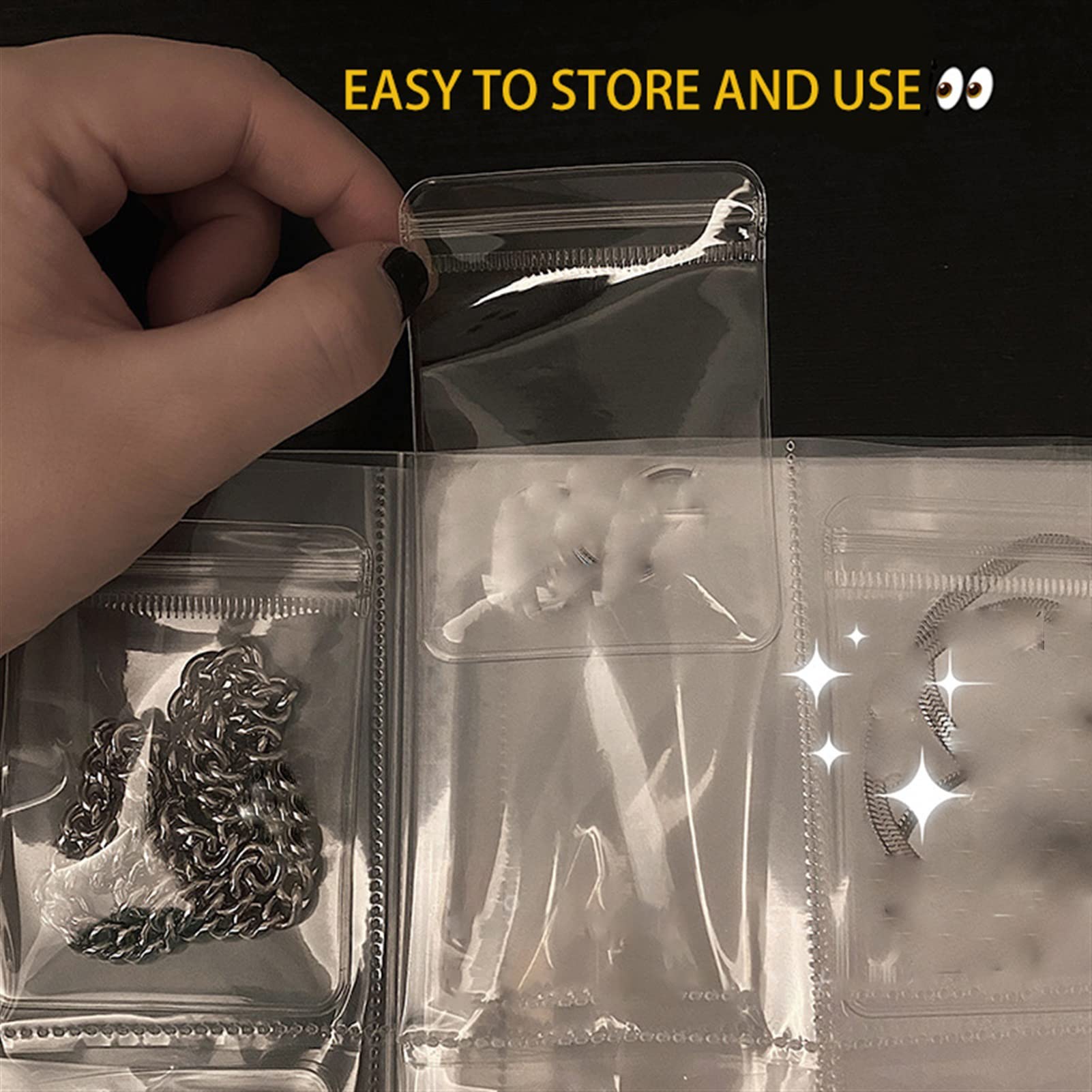 Livre de Rangement Transparent pour Bijoux, d'organisation 84 Emplacements avec 50 Sacs Ziplock