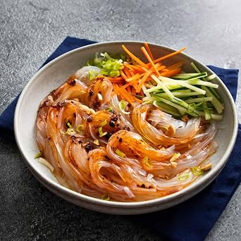5.5 oz MUNG BEAN VERMICELLI (dried glass, cellophane, or bean thread noodles), also known as , , Mien, Bun, , Sotanghon, Soun, Bihun kaca, and , is a versatile ingredient used in dishes such as Fen Si Tang , Yen Ta Fo , Sotanghon Soup, Pad Woon Sen , Japchae , and Dou Fu Fen Si .