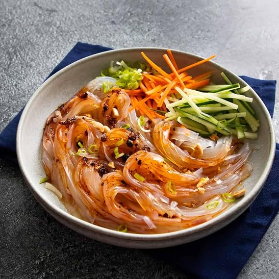 5.5 oz MUNG BEAN VERMICELLI (dried glass, cellophane, or bean thread noodles), also known as , , Mien, Bun, , Sotanghon, Soun, Bihun kaca, and , is a versatile ingredient used in dishes such as Fen Si Tang , Yen Ta Fo , Sotanghon Soup, Pad Woon Sen , Japchae , and Dou Fu Fen Si .