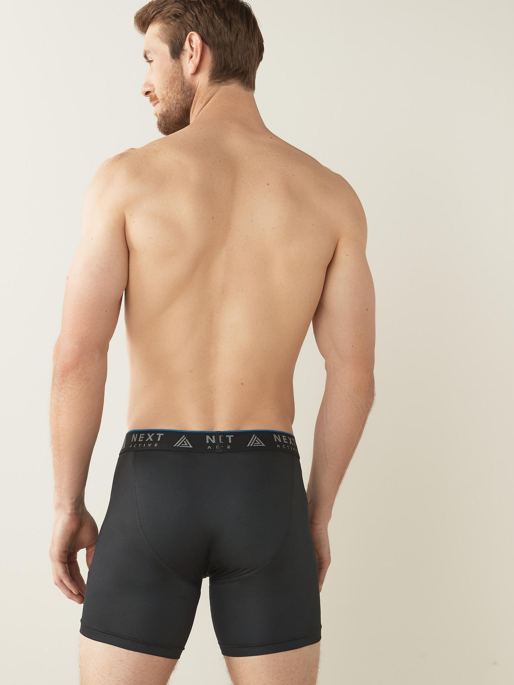 NEXT Hombres Pack de 4 Calzoncillos Deportivos de Estilo más Largo