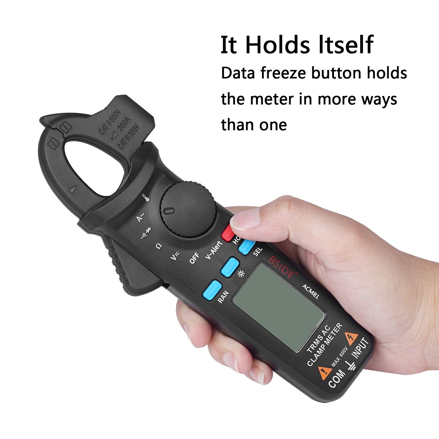 Hand holding the clamp meter with the HOLD button pressed, showing a frozen reading on the display