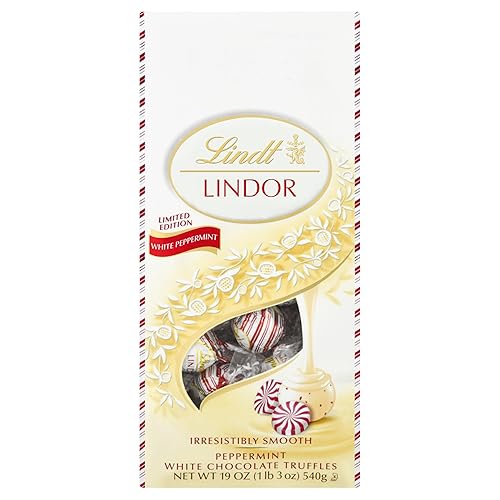 Vista 38 de Lindt LINDOR Trufas de caramelo de chocolate blanco, chocolate blanco con centro de trufa suave y derretida, bolsa de 5.1 onzas