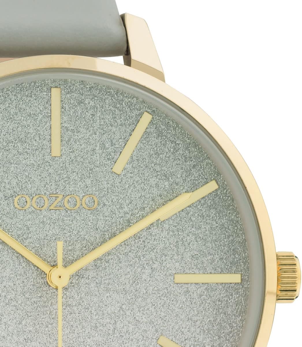 Oozoo Orologio da donna con cinturino in pelle e quadrante glitterato 42 mm di diametro in diverse varianti Oozoo Orologio da donna con cinturino in pelle e quadrante glitterato 42 mm di diametro in diverse varianti