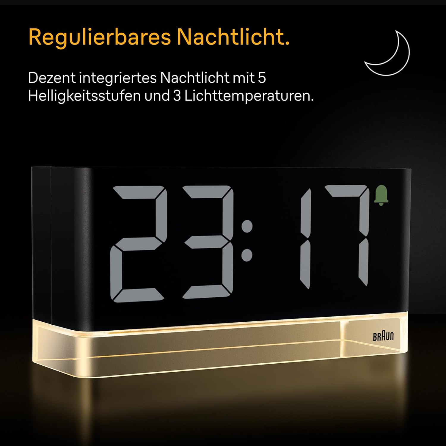 Ճակատ view of Braun BC27B Digital Alarm Clock with the base illuminated by the night light, displaying 23:17.