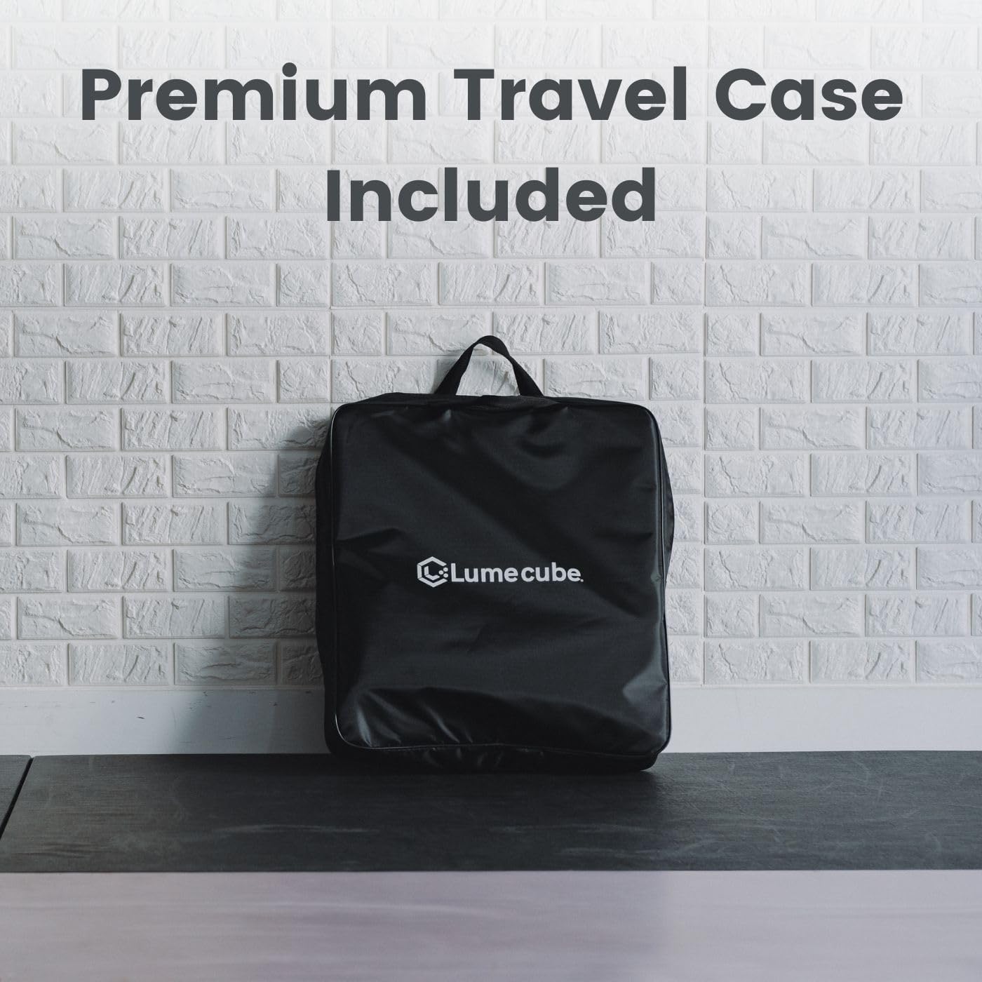 A side view of the Lume Cube ring light tilted upwards, demonstrating its 180-degree tilt capability for precision lighting. A smartphone is mounted within the ring light.