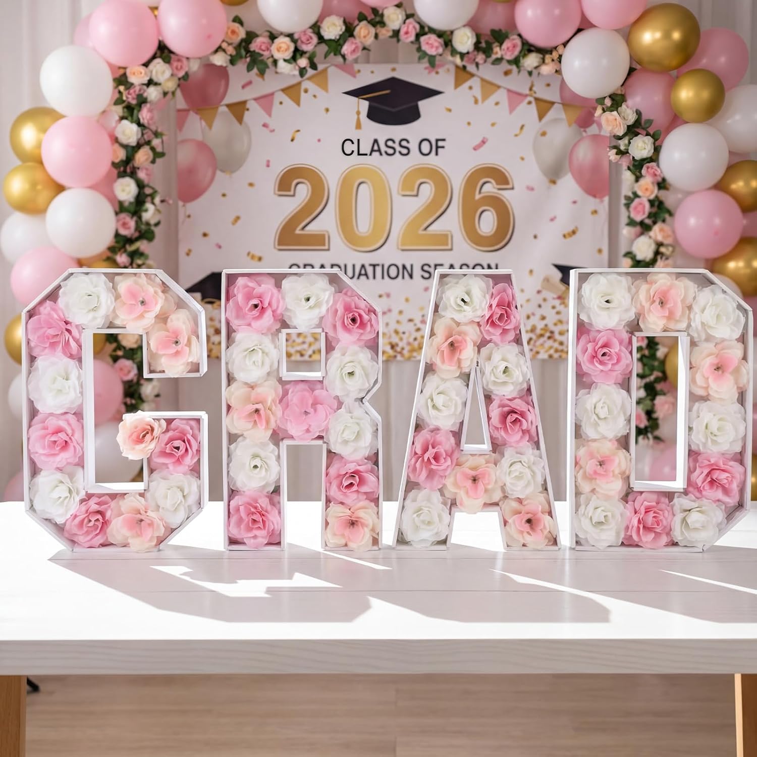 Bucherry 15.7 Inch 2026 Pink Graduation Decorations Grad Letters with Artificial Flowers Pink Graduation Table Decorations Foam Grad Letter Board 2026 DIY Table Decor Sign for College Party Supplies