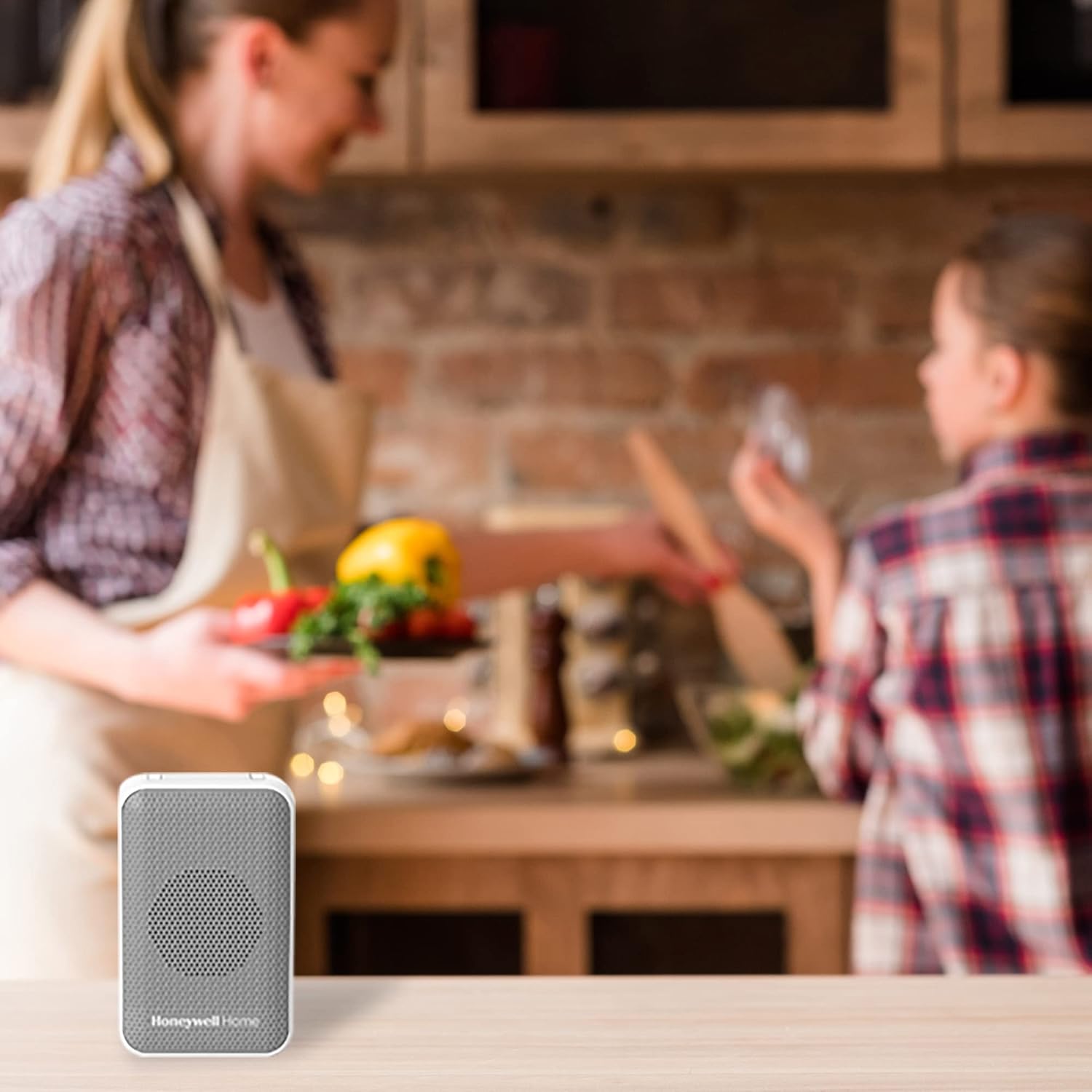 Honeywell Home Wireless Doorbell placed on a kitchen counter