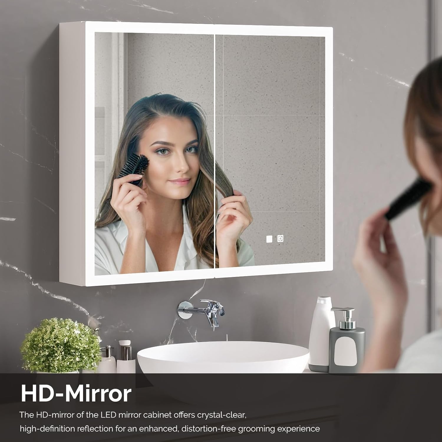 Woman looking into the HD mirror of the medicine cabinet, applying makeup