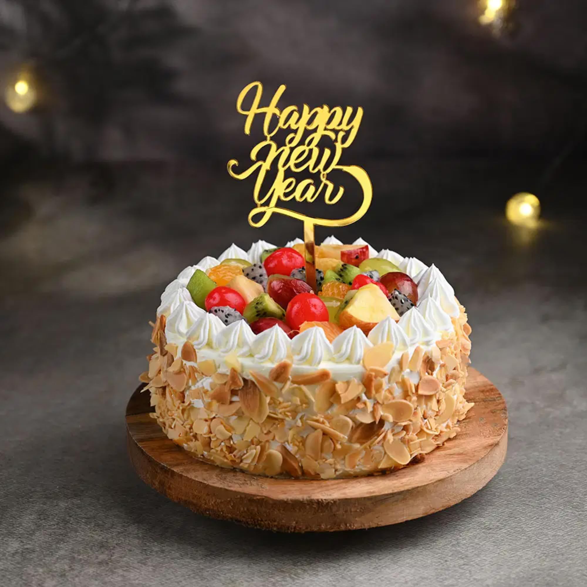 Bakingo New Year Special Fresh Yummy Mixed Fruit Eggless Cake With Topper | New Year Celebration Cake | 2025 Celebrations Cake | New Year's Eve Cake | Party Cake (Same Day Delivery) (1Kg)-image-15