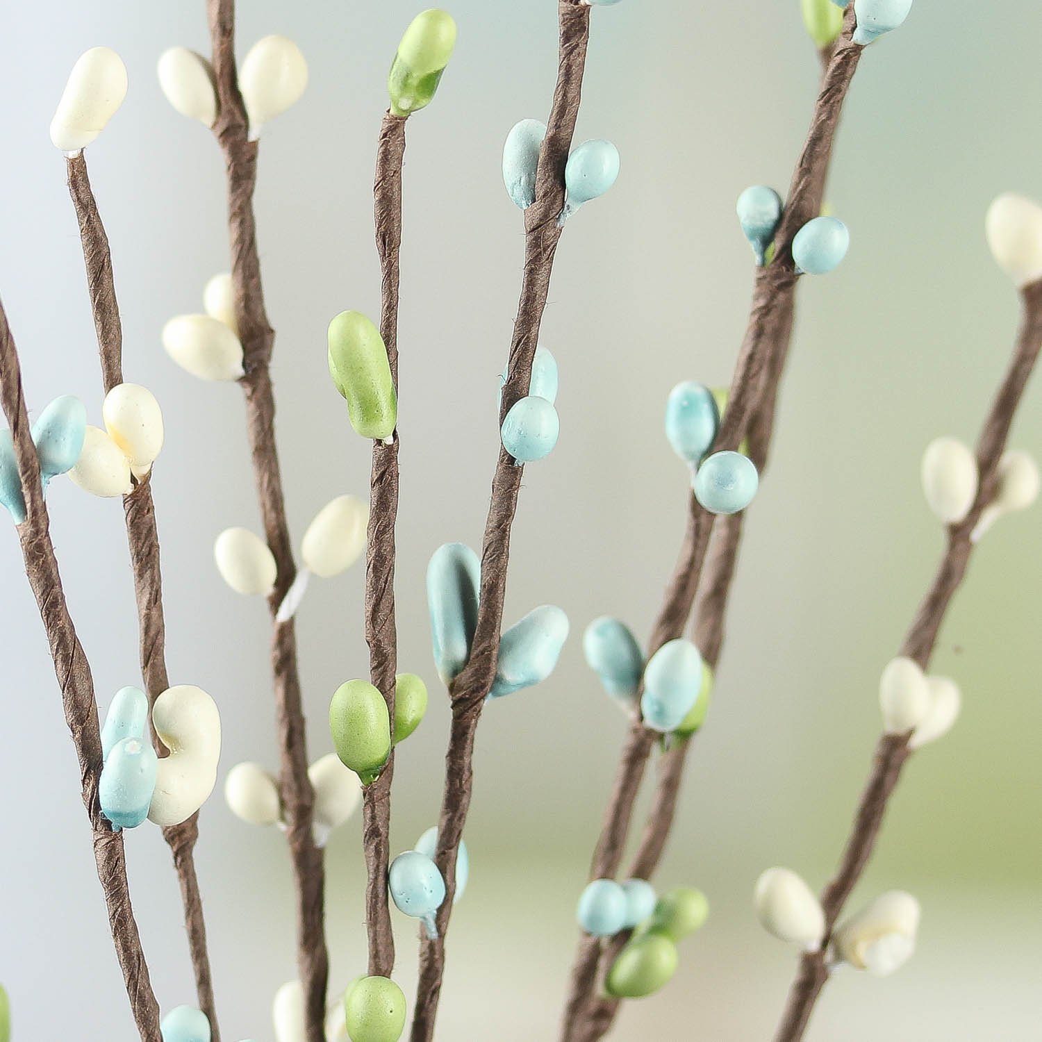 Factory Direct Craft Blue, Green & Cream Stems-(12 Pieces) These 12 Inch Long Pip Berry Sprays in Soft Blue, Green, and Cream are Great Costal Sea Breeze Colors. Use as Centerpieces or Accents