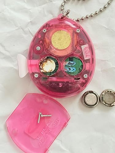 Amazon.co.jp: バンダイ 初代 たまごっち スケルトンピンク色（時計柄