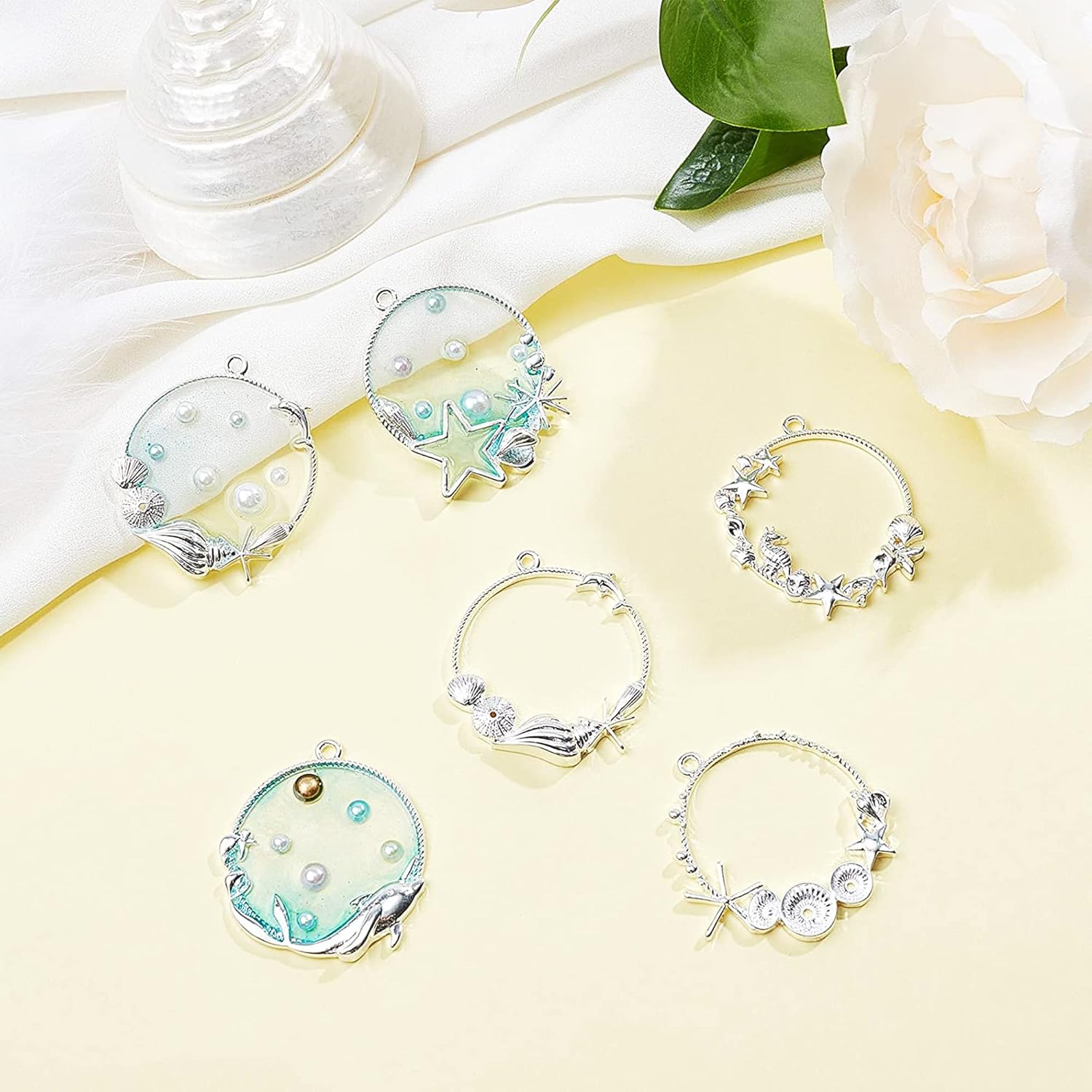 Allazone Open Bezel Charms, 28 PCS Sea Theme Open Bezels for Resin 7 Style Alloy Frame Pendants, Gold Hollow Frames for Necklaces & Earrings Making Supplies - Image 3