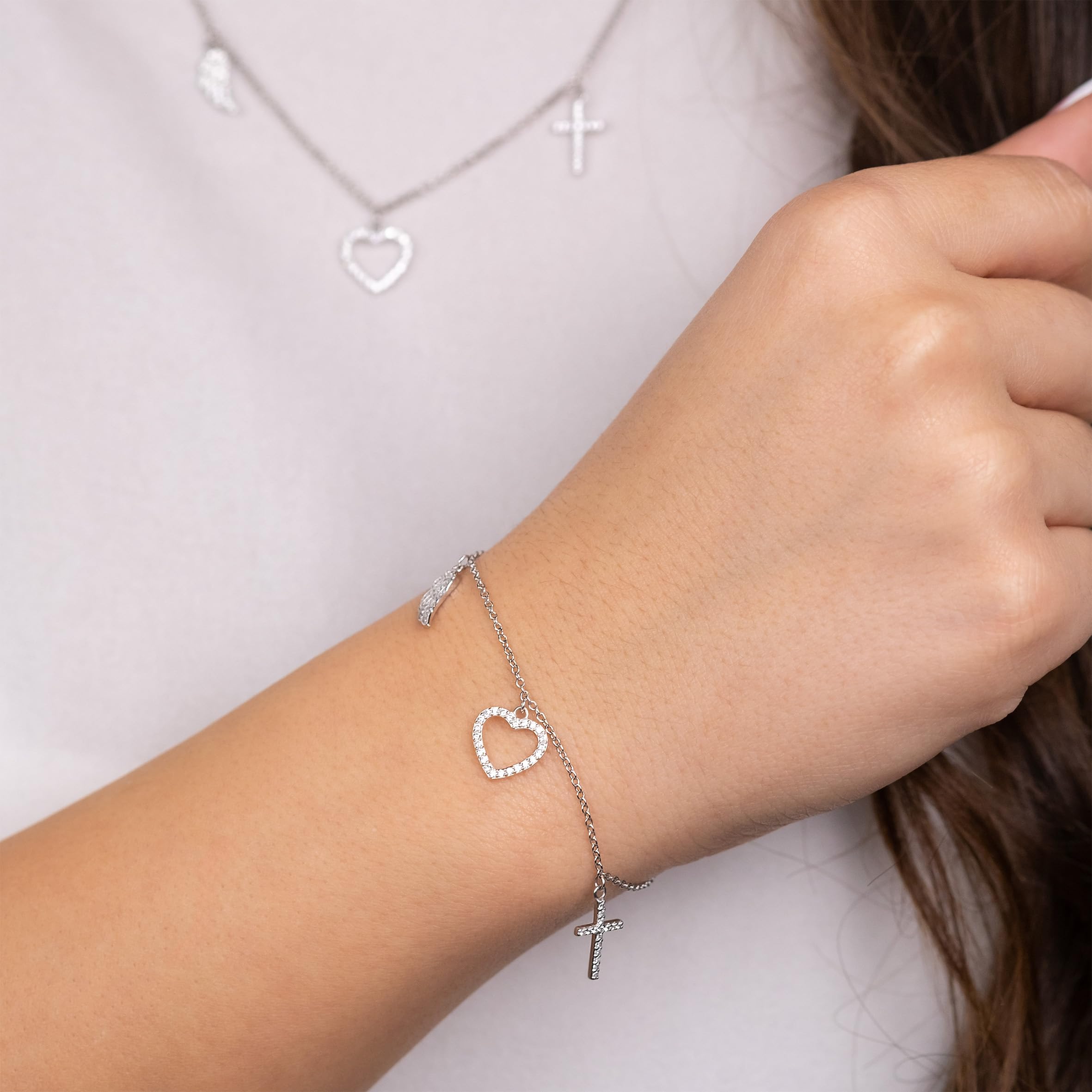 Engelsrufer Damen Armband aus Sterling Silber mit Zirkonia und Anhänger - Kreuz Herz Engelsflügel - Karabinerverschluss - längenverstellbar - nickelfrei