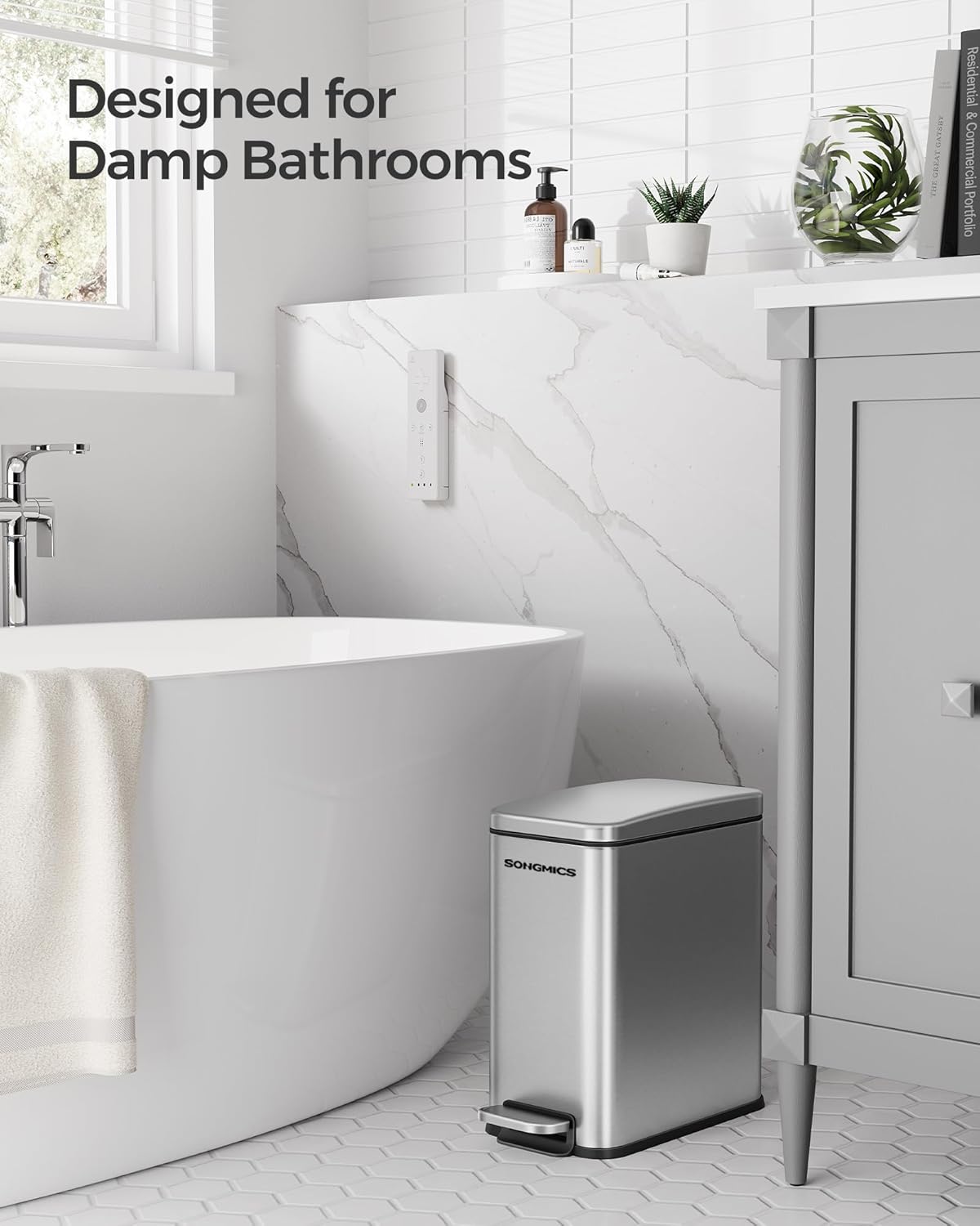 Trash can in a bathroom setting, emphasizing its design for damp amgylcheddau