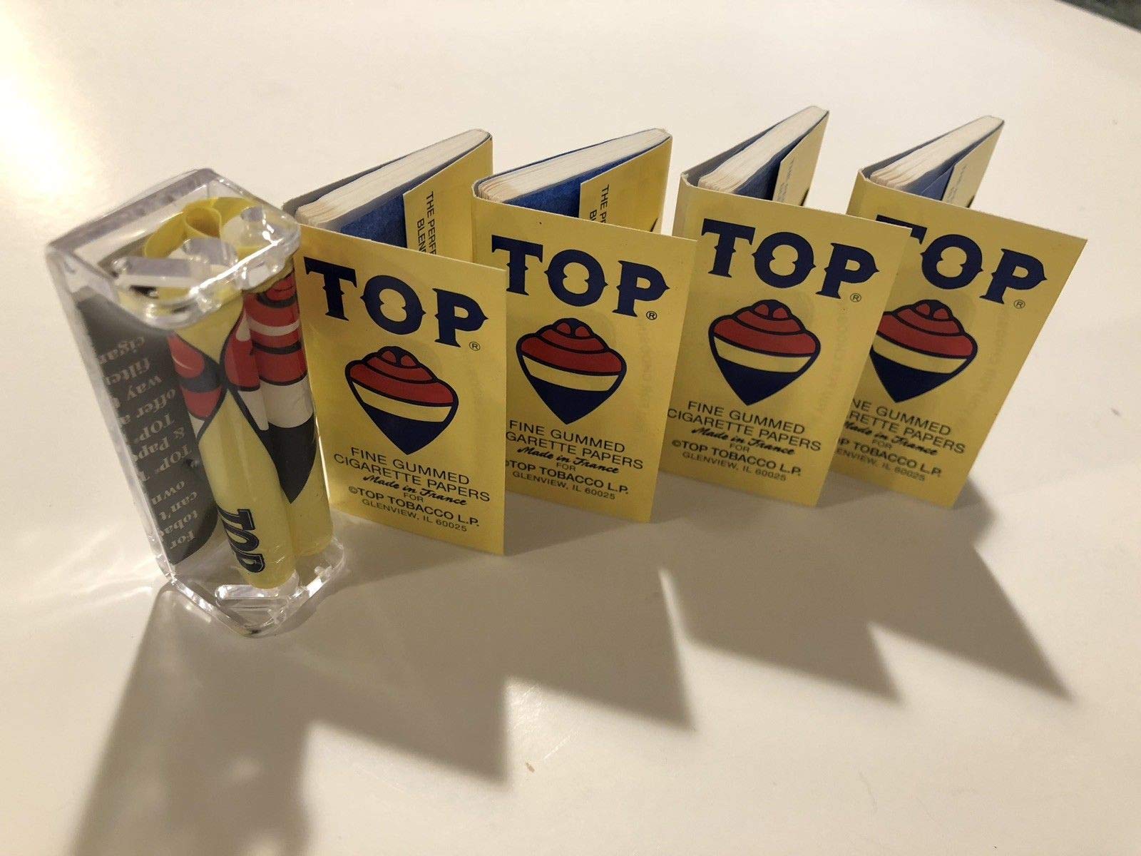 Top Cigarette Rolling Papers by DeLaCruzV (4 Packs) + Top Rolling Machine 70MM, Raw Black Clipper and Small DoobTube.