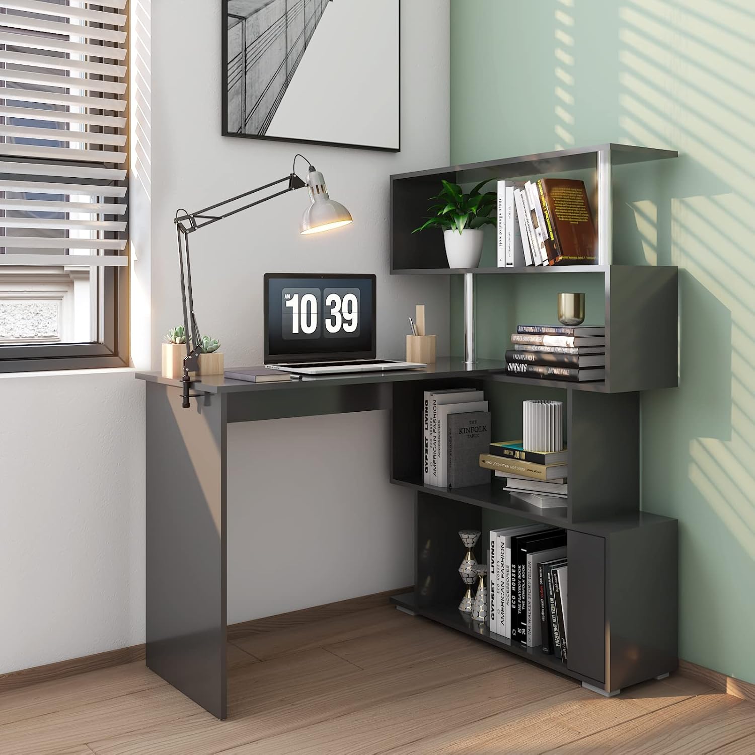 Mondeer L-shaped desk in a corner setup, black finish, with a laptop and decorative items.