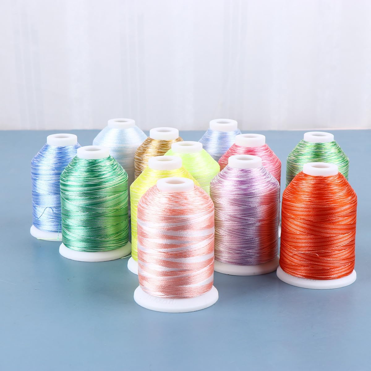 jojofuny 12 Rolls Computer Embroidery Thread Kit 12 Colors 1000m Each Roll Cross Stitch Floss for Sewing Machine and Hand Embroidery Craft Supplies