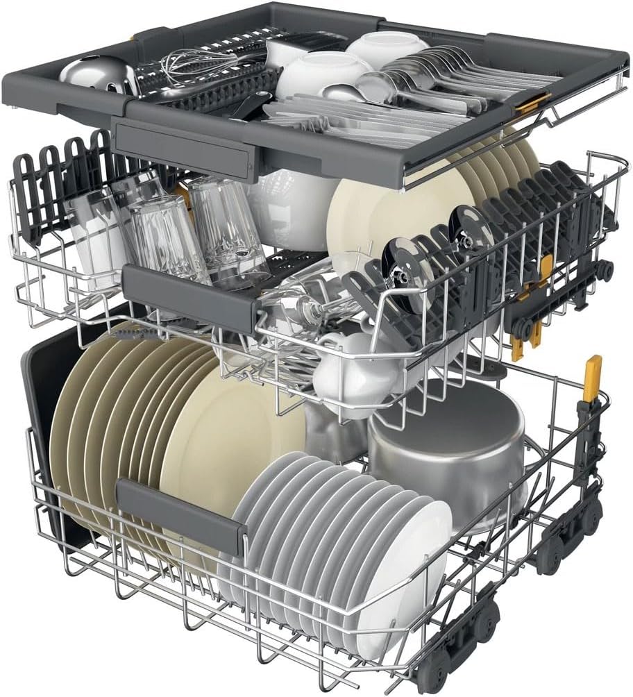 Dishwasher racks loaded with dishes and cutlery