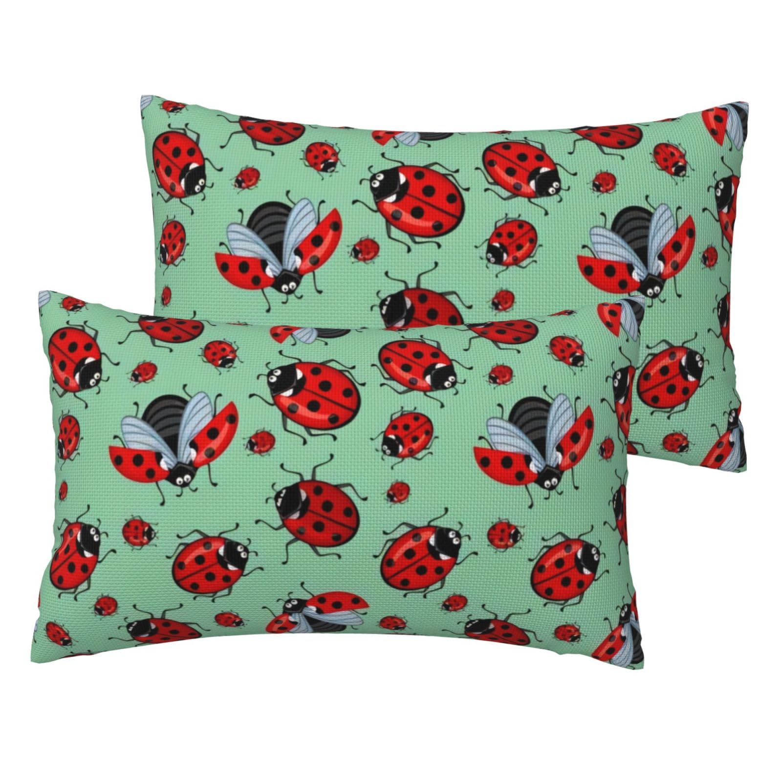 Housse de coussin lin bleu coccinelles pour décorer le salon