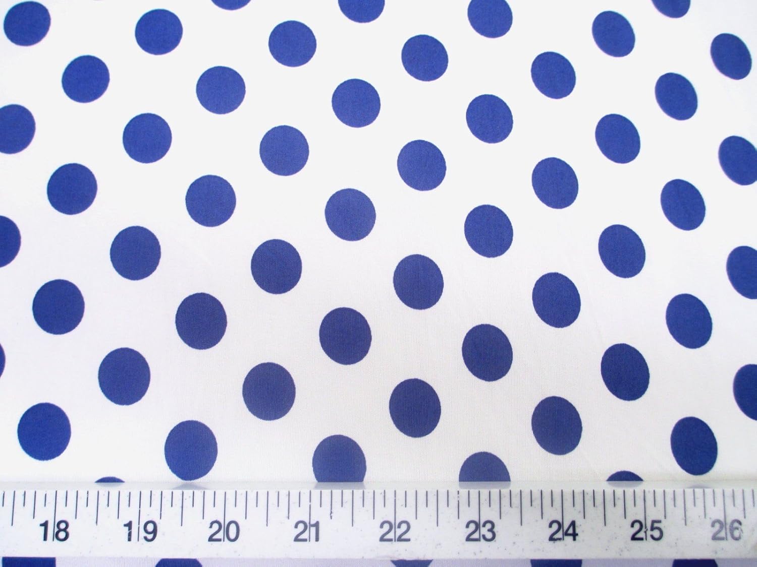 Discount Fabric Printed Spandex Stretch White with Blue Polka Dots G202
