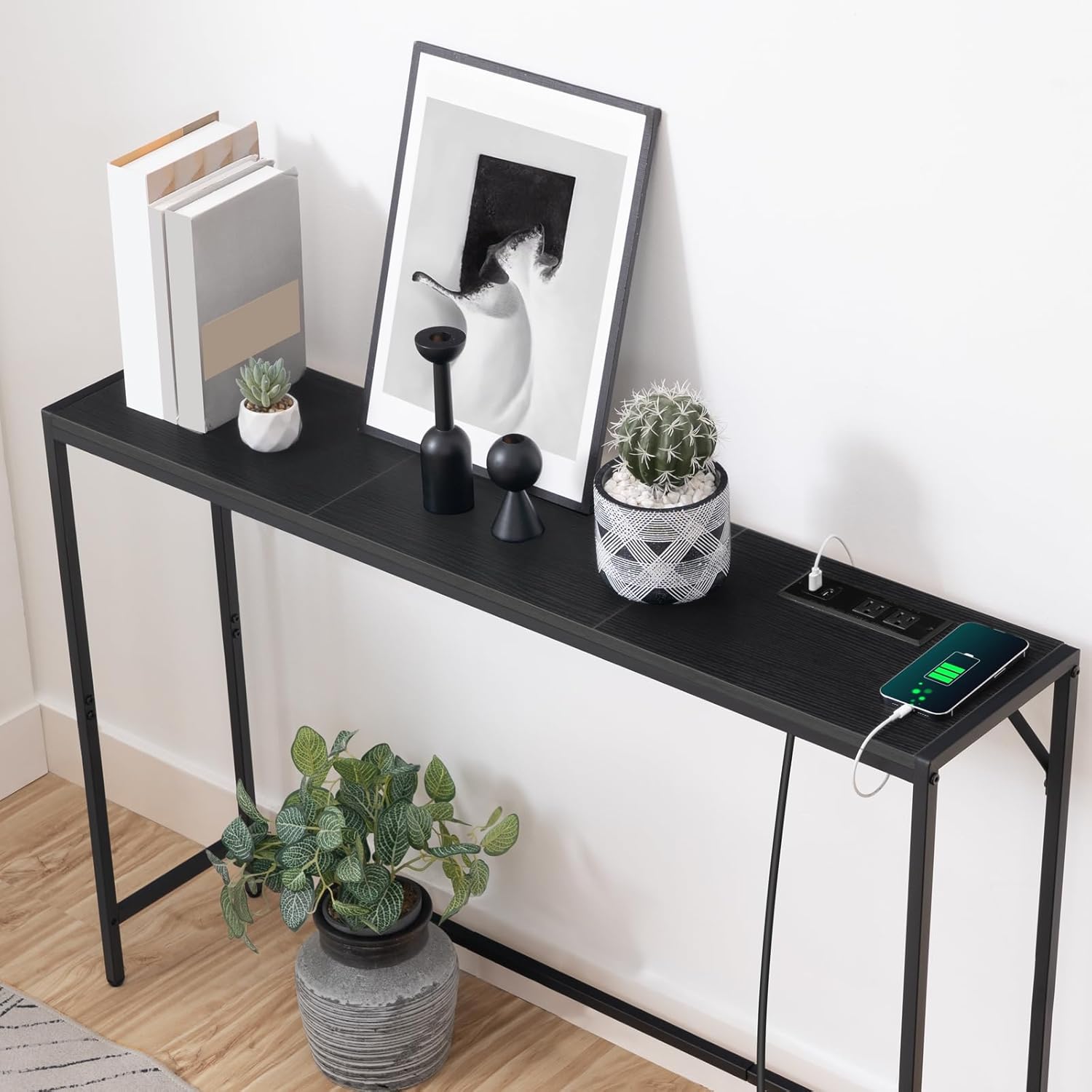 Close-up of the console table's power station with 2 AC outlets and 2 USB ports