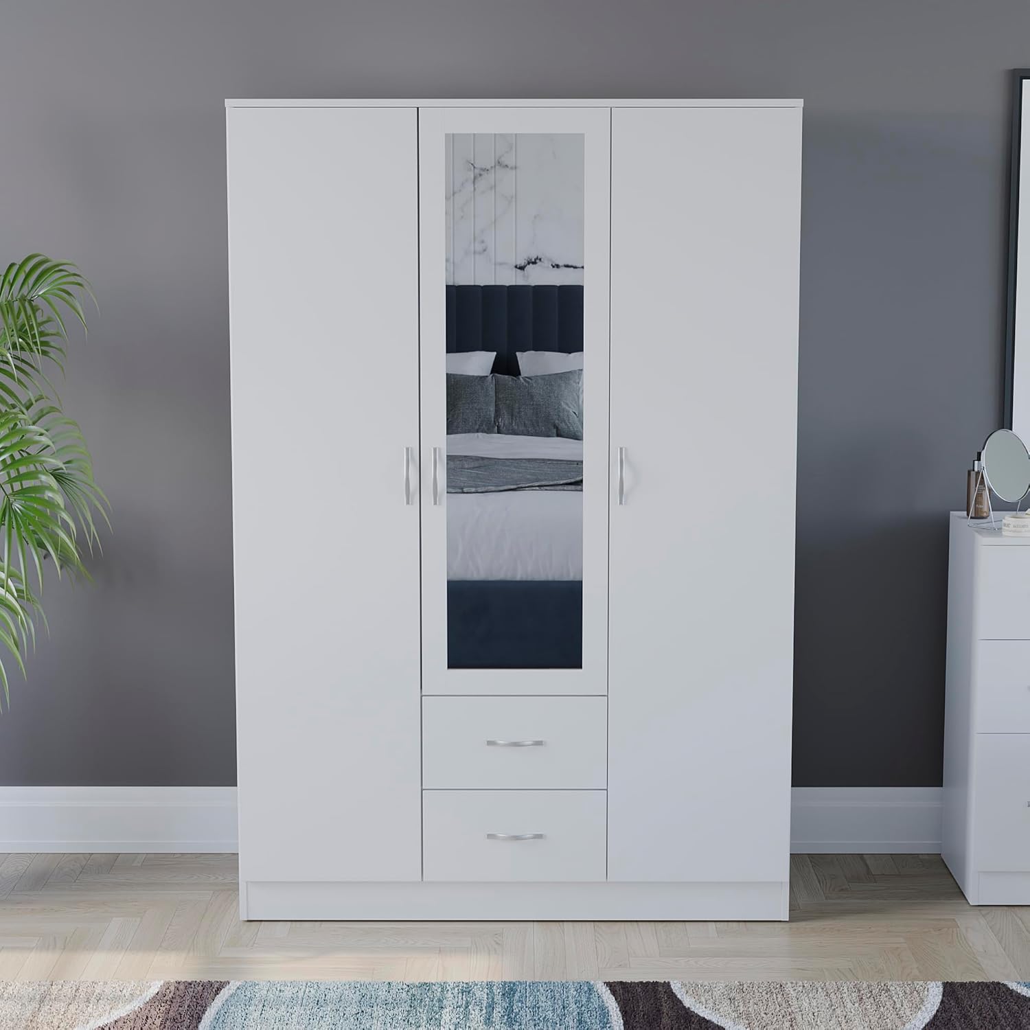 Interioré view of the assembled wardrobe showing hanging space, shelves, and drawers