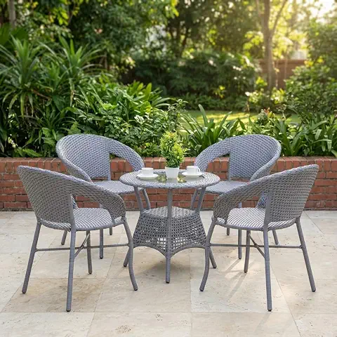 A stylish outdoor chair transforms the balcony into a peaceful relaxation corner. It's the perfect place to enjoy fresh air, coffee, or the stunning nighttime skyline.