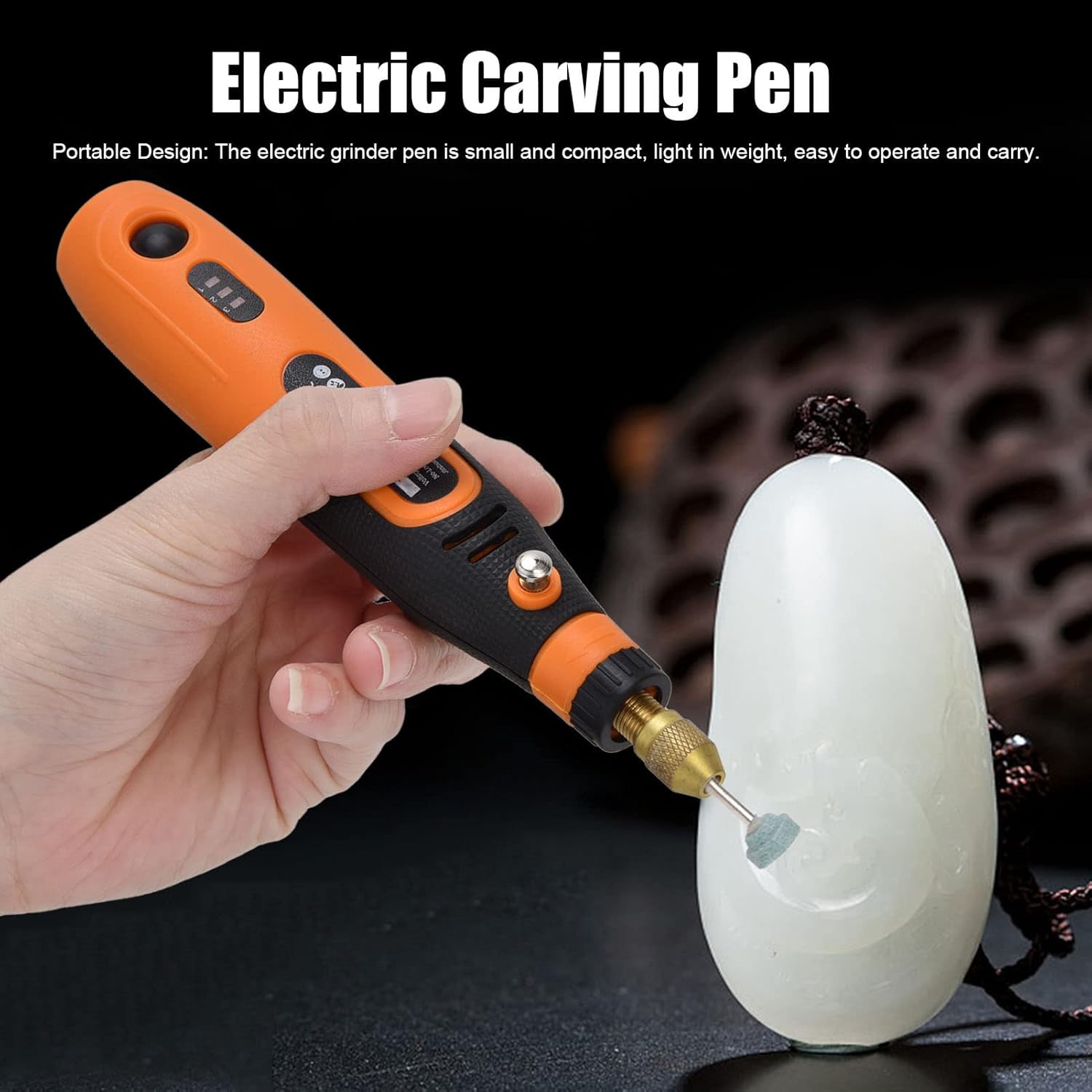 Person using the rotary tool to carve a small object
