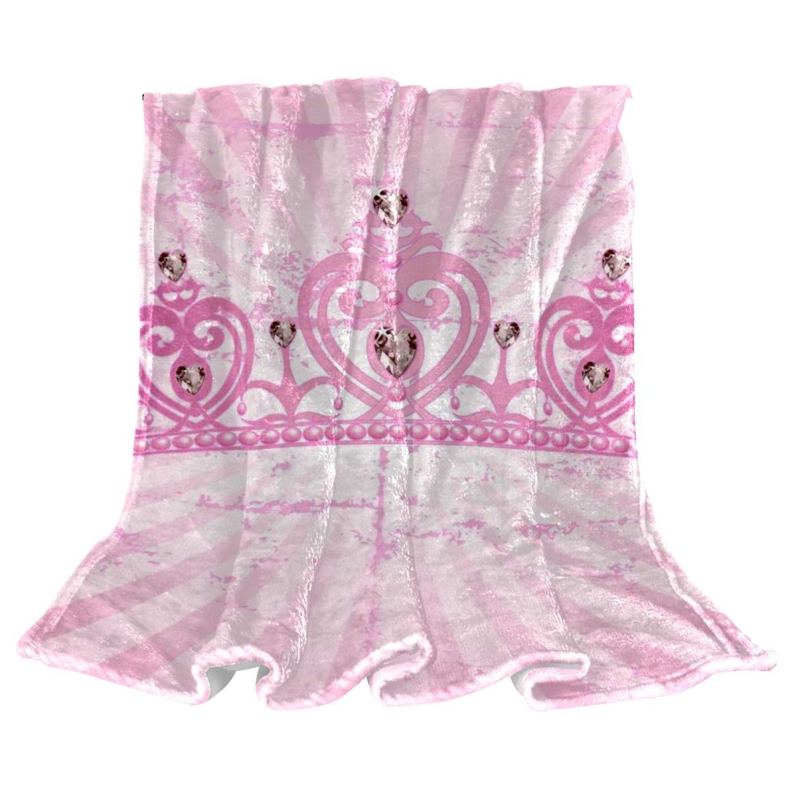 Couvre-lit doux rose idéal pour une chambre d'enfant cocooning