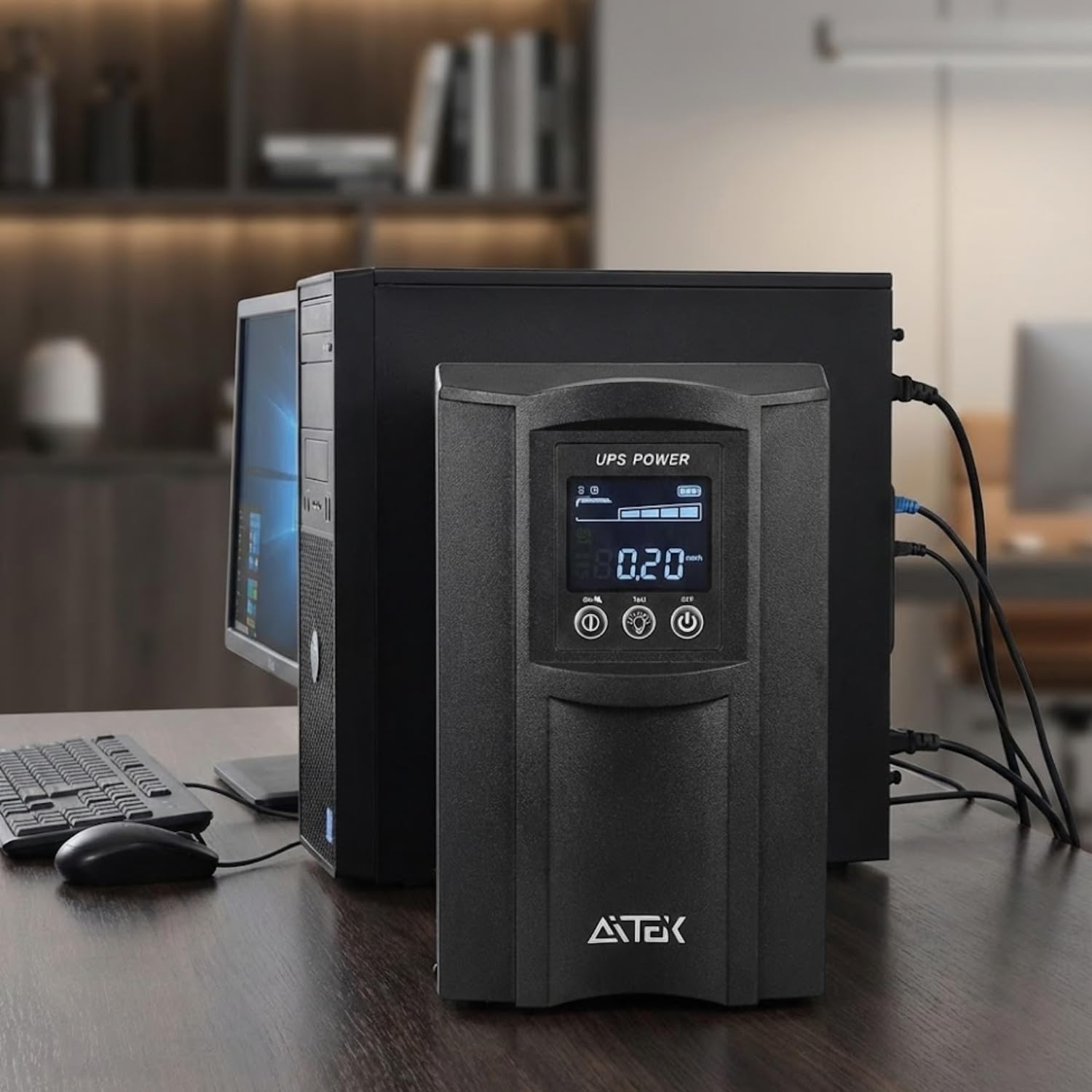 AITEK Pure Sine Wave UPS 3000VA connected to a desktop computer and monitor, providing power protection.
