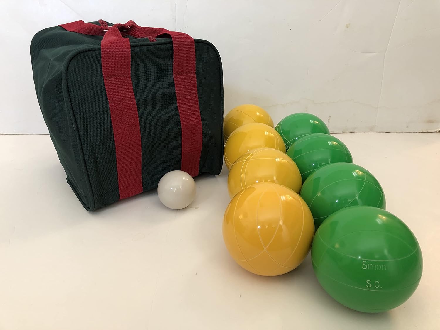 BuyBocceBalls Listing - Made in USA, Premium Quality Engraved Tournament Bocce Set, 998 Grams (2 lbs. 3.2 oz.). Various Bag Colors - 110mm Yellow and Green Balls, Nylon Bag