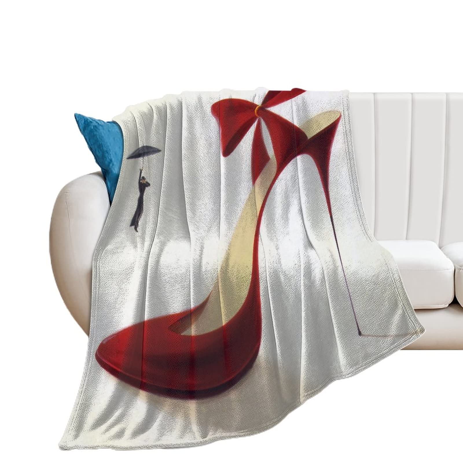 Couverture polaire talons hauts pour une soirée cocooning chic sur votre canapé