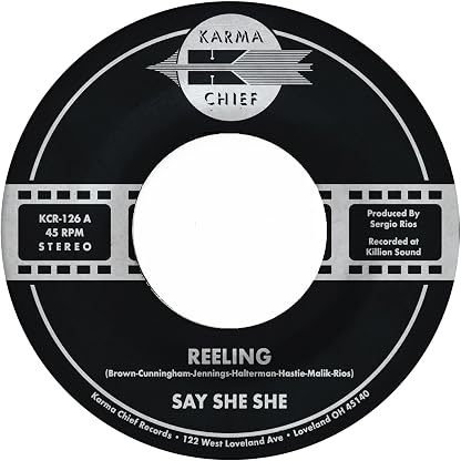 REELING / DON'T YOU DARE STOP (EARTH GREEN 18cm ) por Say She She, capa do álbum