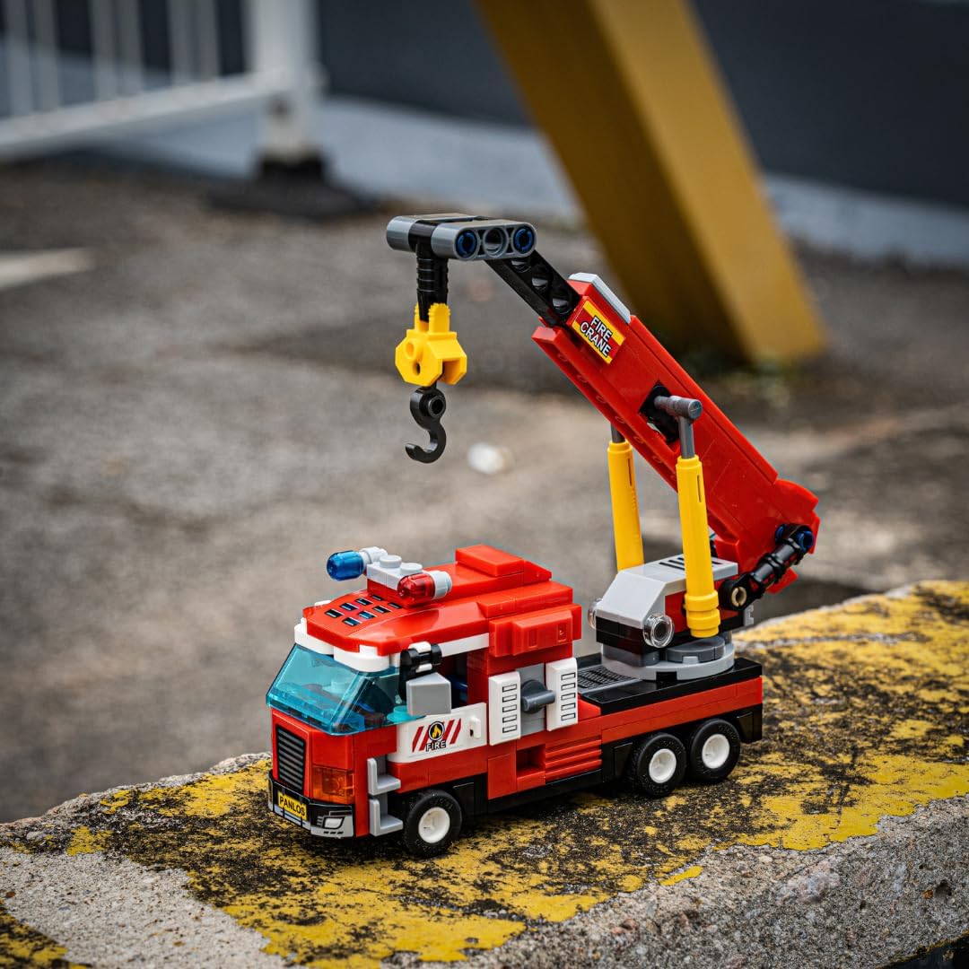 Block Builder Fire Truck Building Block Set (646 Pieces). Fire Rescue Truck Includes Five Different attachments and a Rescue Helicopter. Building Blocks for Kids and Adults.