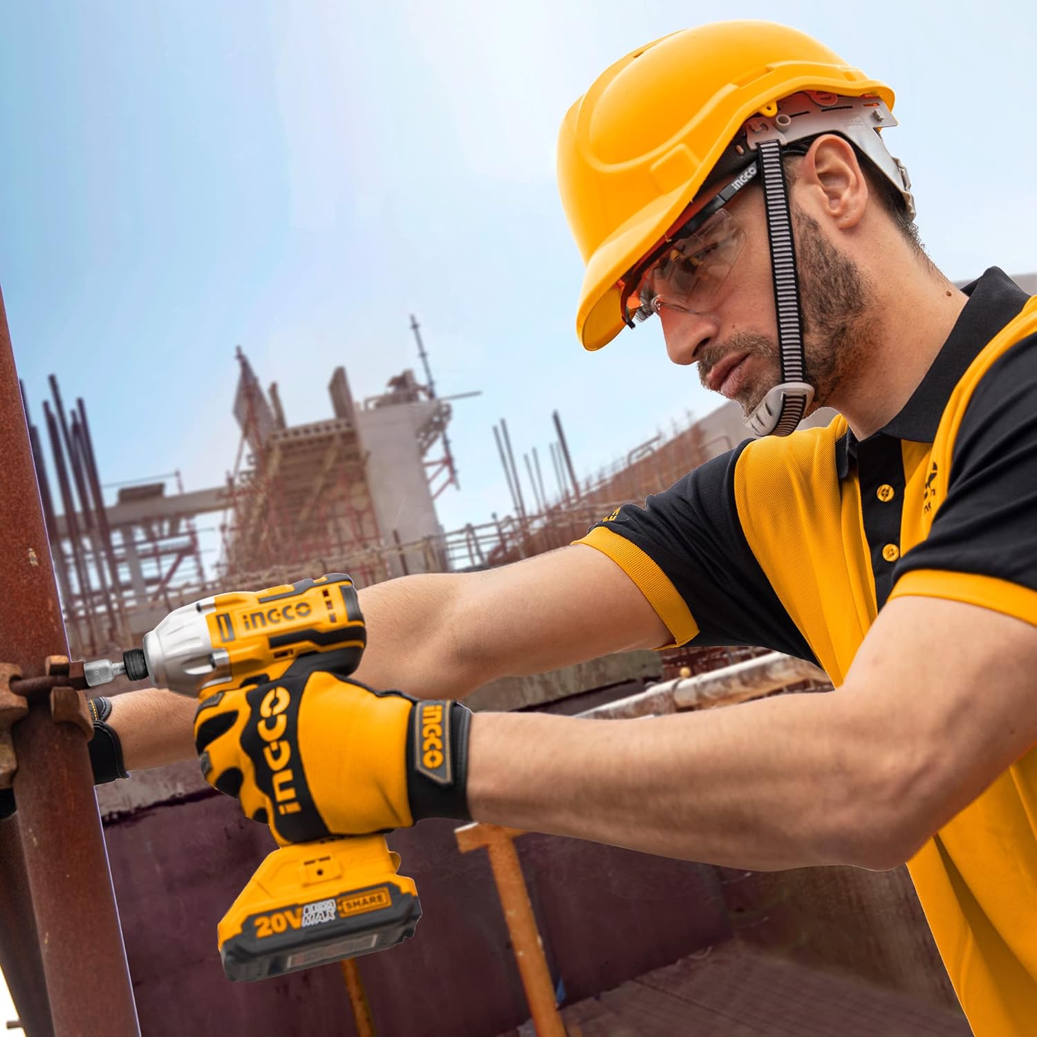 Person using an Ingco Impact Driver to fasten a bolt on a construction site