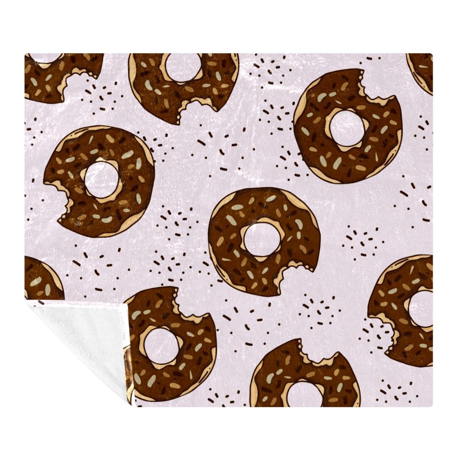 Couverture beignet chocolat douce pour lutter contre le froid sur le sofa