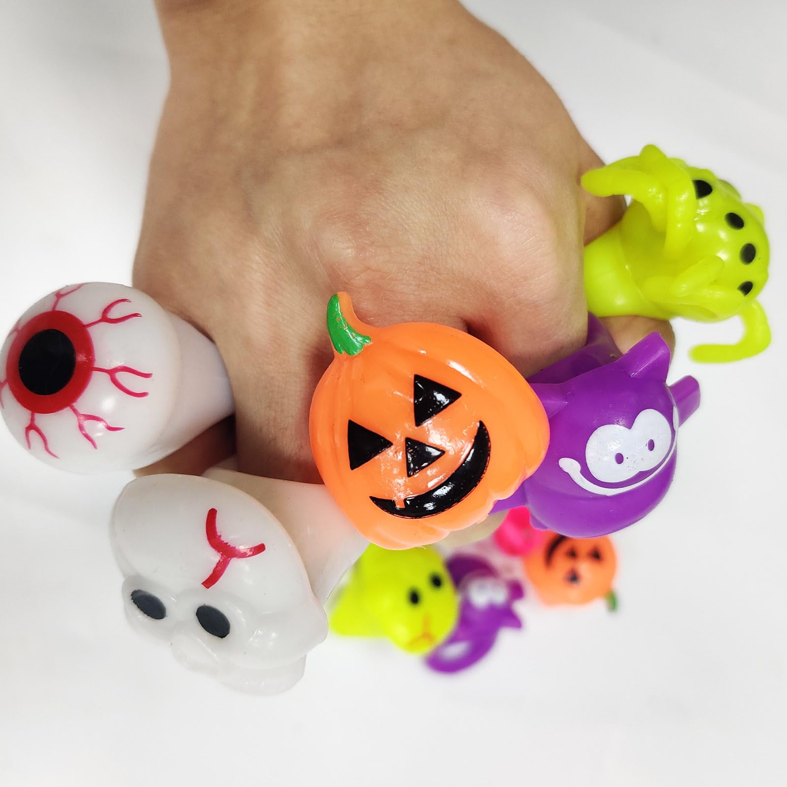 AMENON 24 Pack Halloween Light Up 6 Design Skeleton Bat Ghost Spider Pumpkin Eyeball LED Finger Lights Halloween Soft Rubber Rings for Kids Toys Glow in The Dark Party Favors Goodie Bag Fillers Gifts