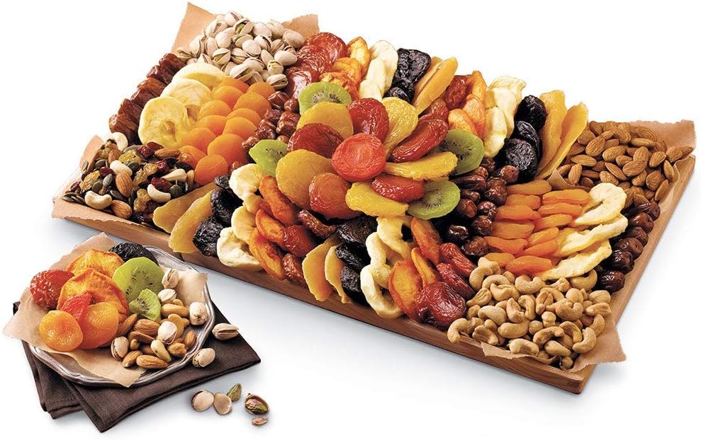 - Harry & David Entertainer's Assorted Dried Fruit Nut Tray, Includes Peaches, Plums, Mangoes, Pears, Kiwis, Apricots, Dates, Prunes. Pistachios, Almonds, Cashews, Pumpkins Seeds, Raisins