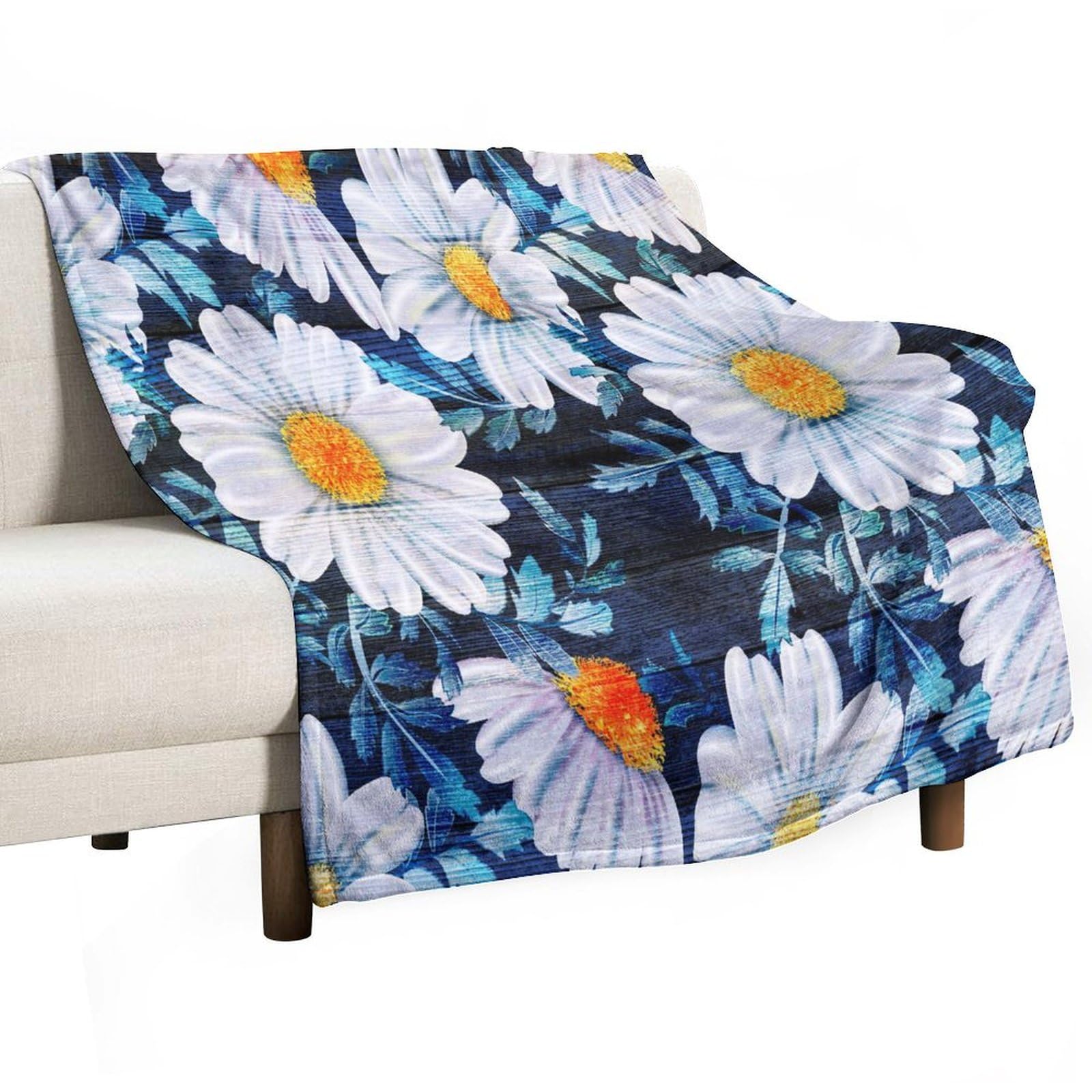 Plaid marguerites blanches pour décoration d'intérieur et soirées cocooning sur sofa