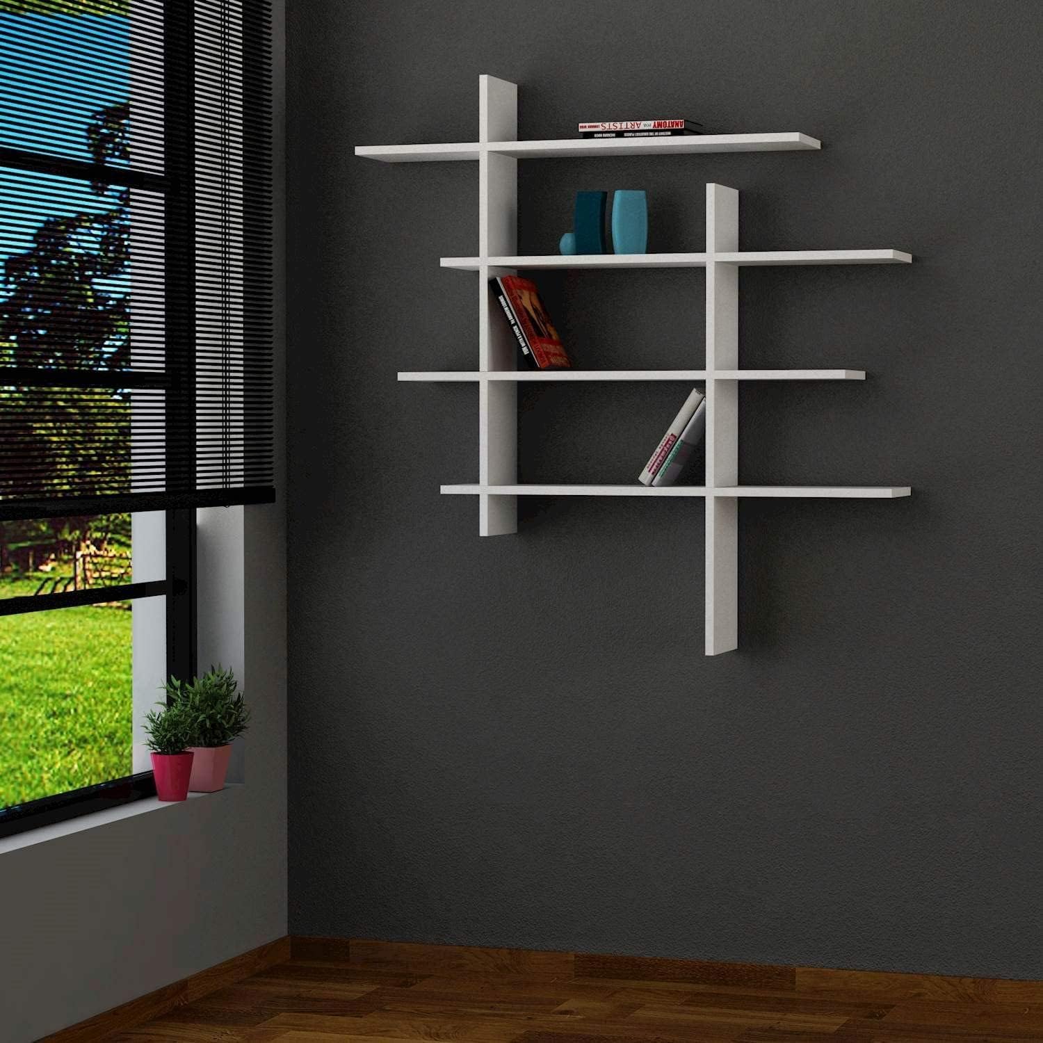 Decortie Line No:1 Modern Wall Shelf installed in a room, displaying books and decorative items.