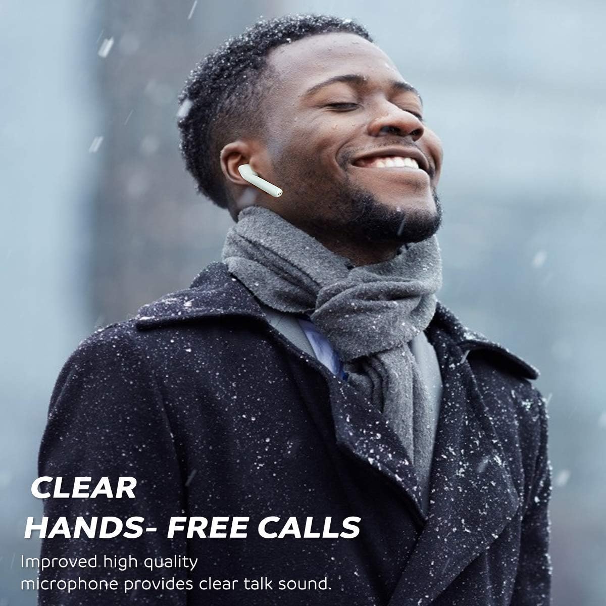 Man smiling while talking on a phone call with a Cshidworld earbud in his ear