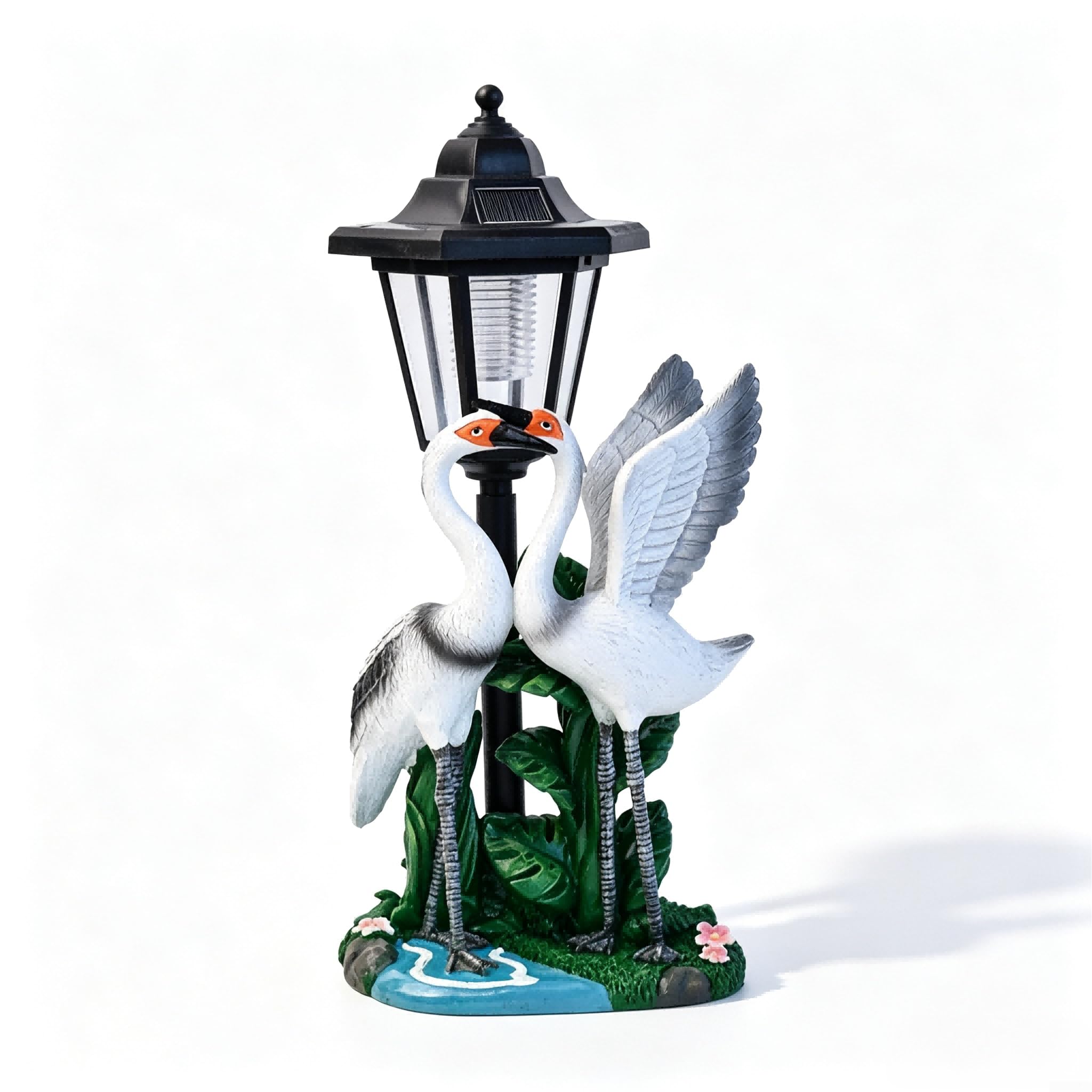 Luce solare del giardino della statua della coppia di uccelli