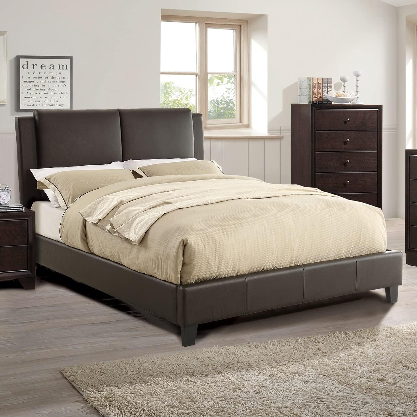 Fully assembled Queen size brown faux leather bed frame with mattress and bedding