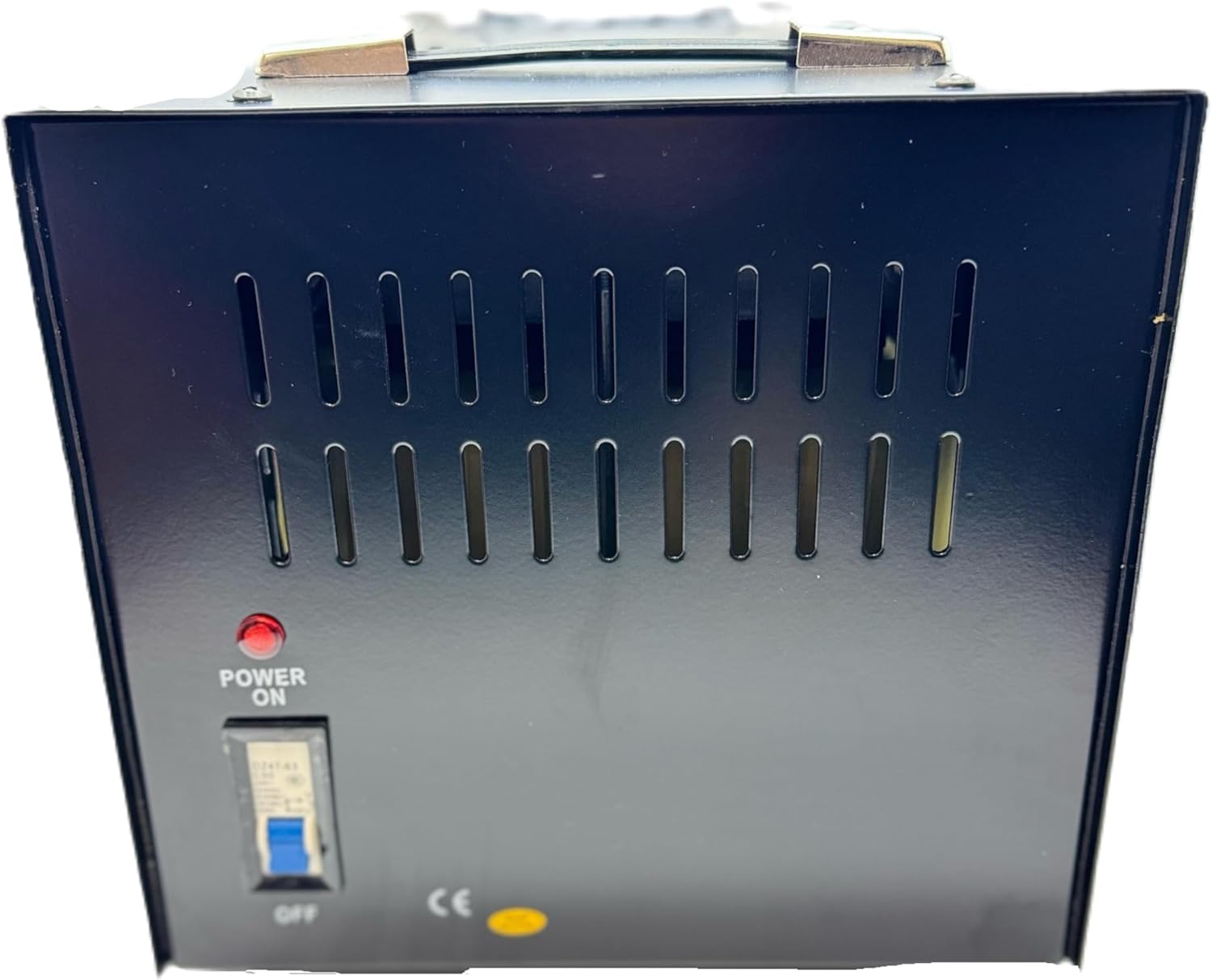 Side view of Simran THG-10000(T) Voltage Transformer showing power switch and ventilation slots.