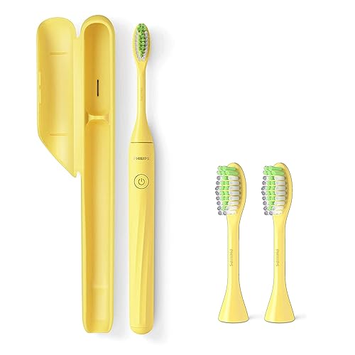 Philips Sonicare Un cepillo de dientes eléctrico con estuche de viaje y 2 cabezales - Mango Yellow