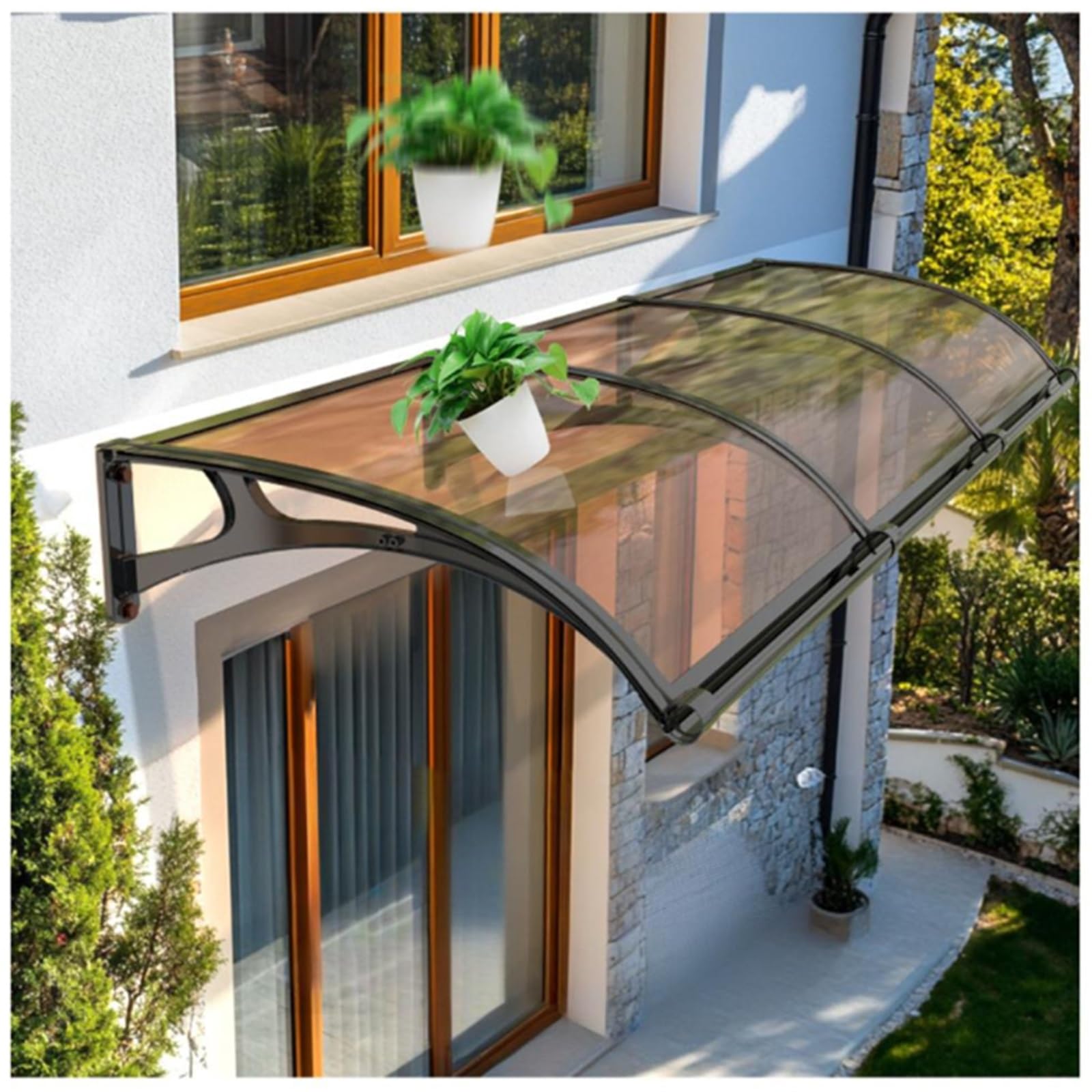 Auvent extérieur en polycarbonate pour stopper la pluie sur la terrasse