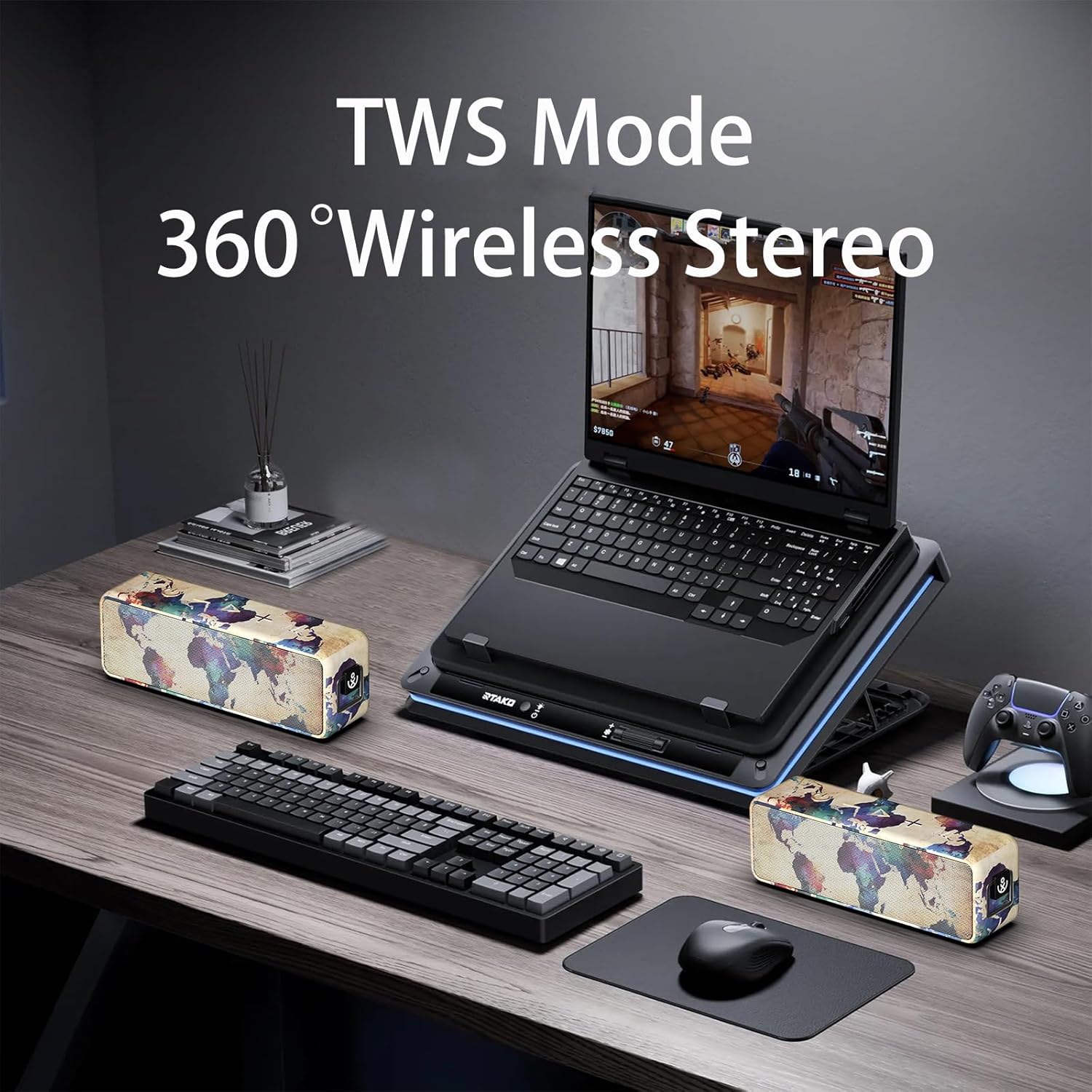 Two xdobo BMTL World speakers set up for True Wireless Stereo (TWS) mode, providing 360-degree wireless stereo sound with a laptop in the background.