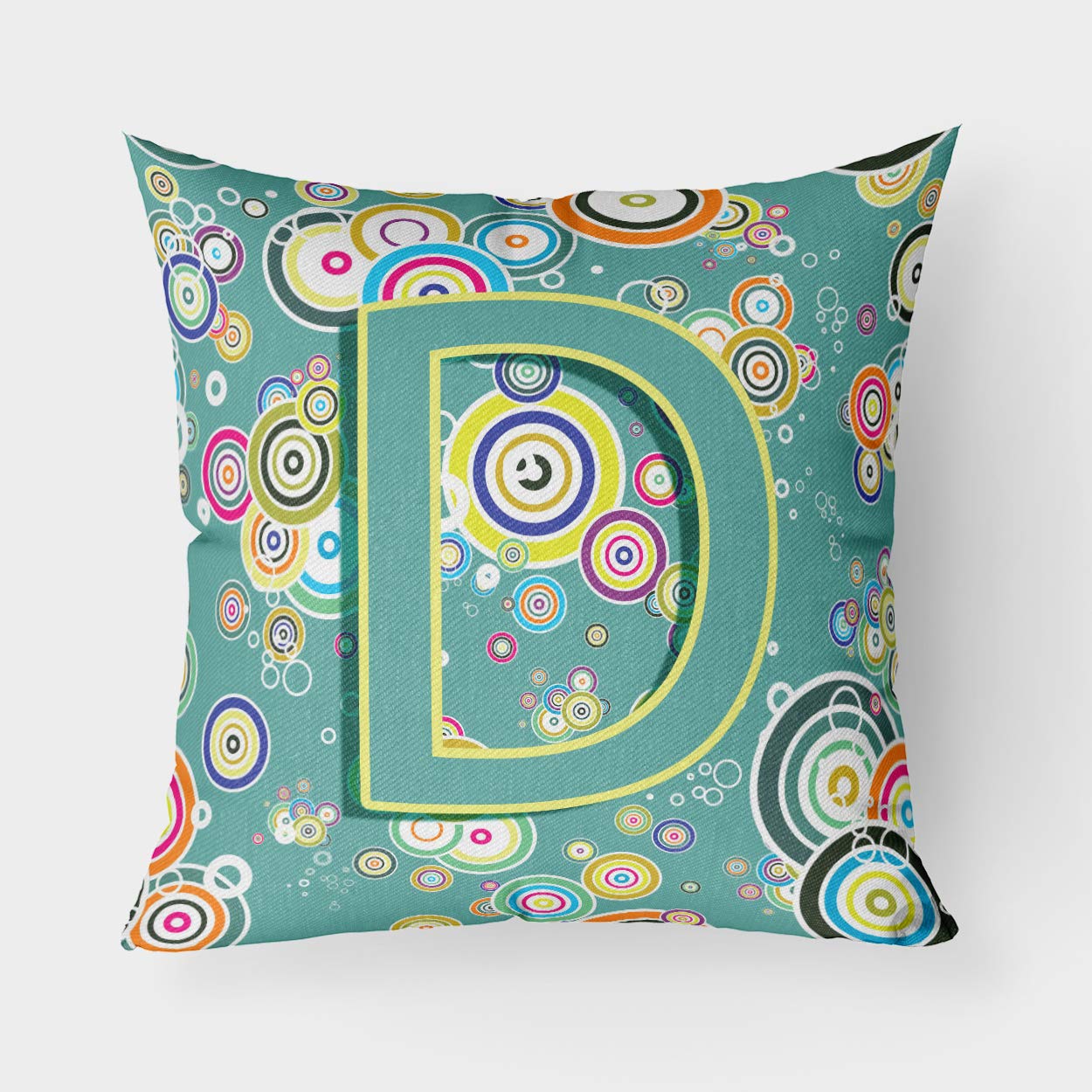 Lettre D coussin bleu sarcelle pour rehausser un canape terne
